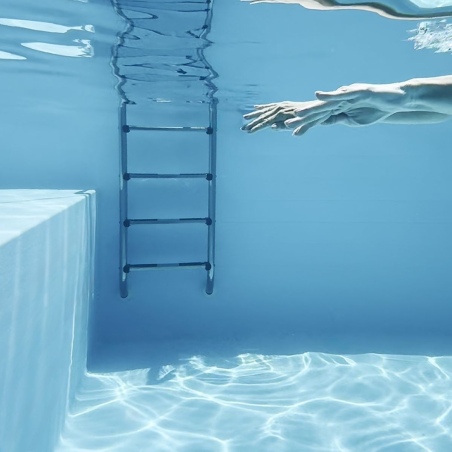 Pool NEMO 5.79 x 3.49 - H.1.45 m mit Liegefläche, grau, mit am Beton verschraubten Stahlprofilen