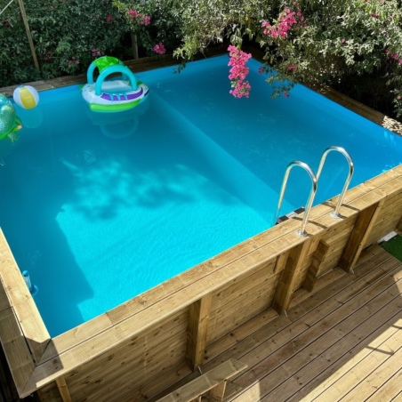 Pool AQUA 8.5 x 4.35 - H.1.45 m mit Liegefläche, hellblau, mit am Beton verschraubten Stahlprofilen