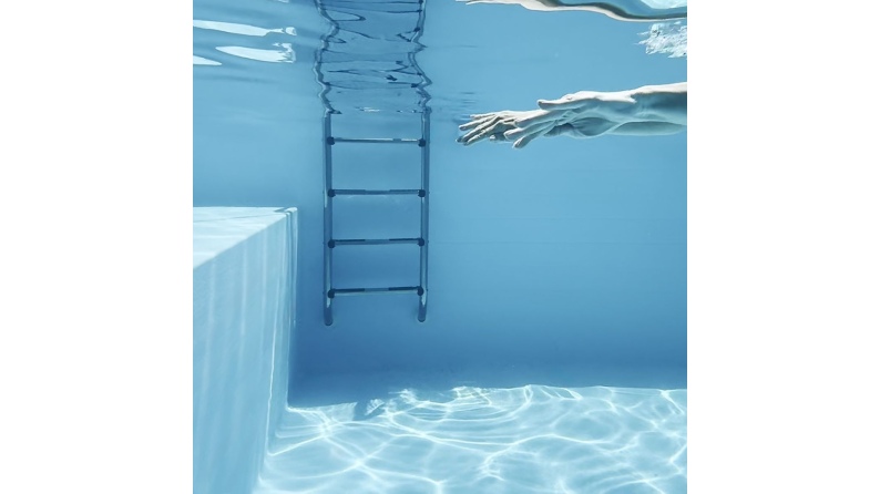 Pool NEMO 5.79 x 3.49 - H.1.45 m mit Liegefläche, grau, mit am Beton verschraubten Stahlprofilen