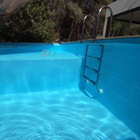 Pool AQUA 10.2 x 5.2 - H.1.45 m mit Liegefläche, hellblau, mit am Beton verschraubten Stahlprofilen