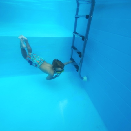 Pool AQUA 10.2 x 5.2 - H.1.45 m mit Liegefläche, grau, mit am Beton verschraubten Stahlprofilen